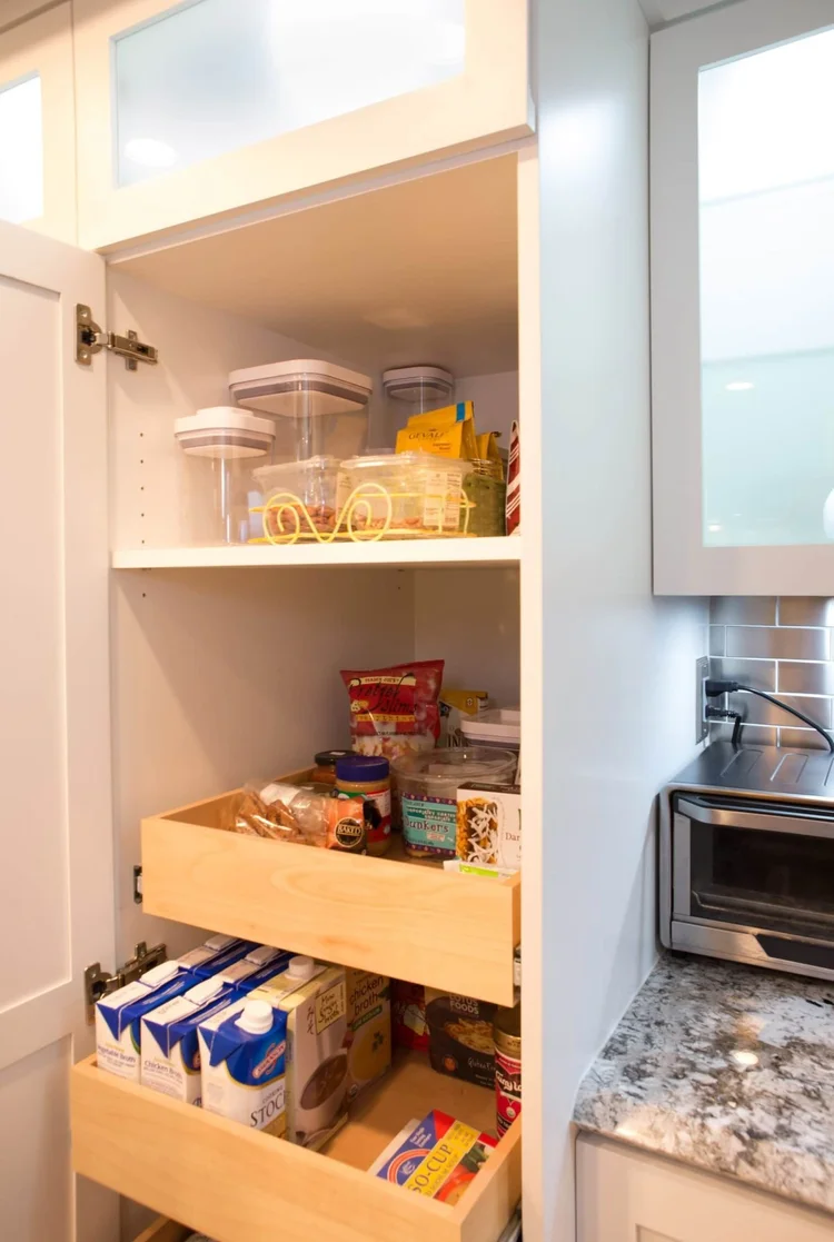 White Shaker Kitchen Remodel with Integrated Laundry Storage — photo 5