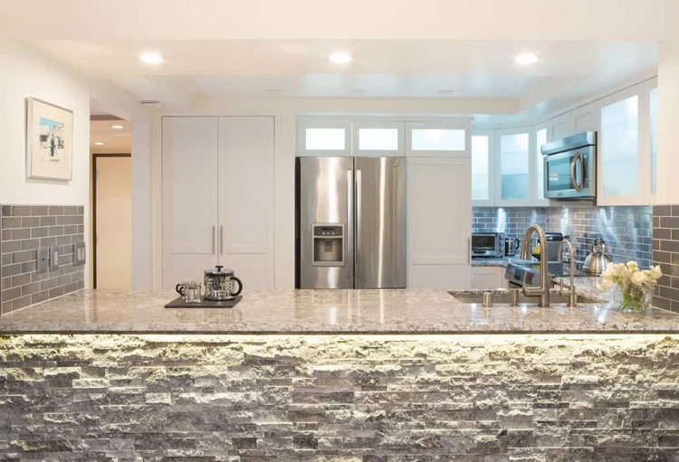 White Shaker Kitchen Remodel with Integrated Laundry Storage — photo 3