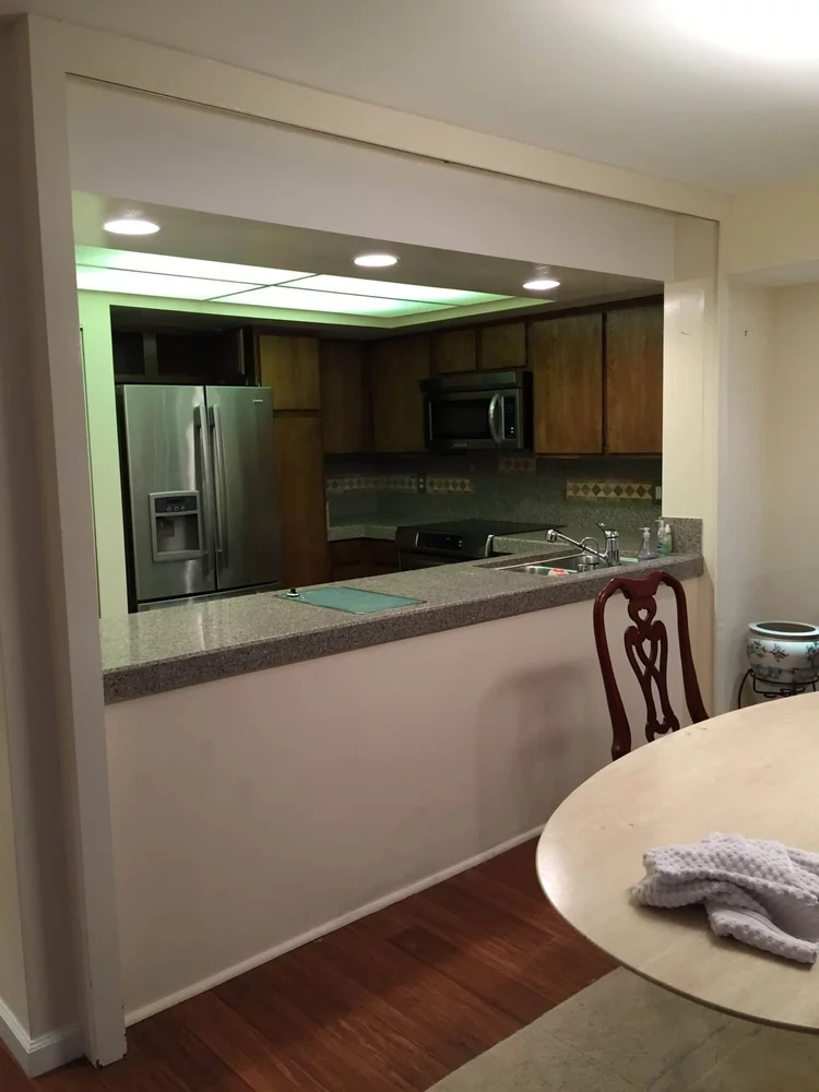 White Shaker Kitchen Remodel with Integrated Laundry Storage — photo 10