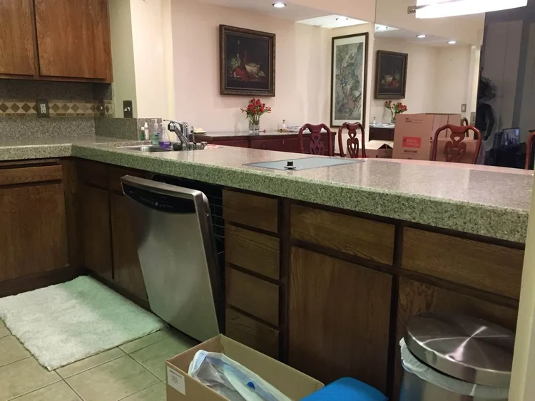 White Shaker Kitchen Remodel with Integrated Laundry Storage — photo 11